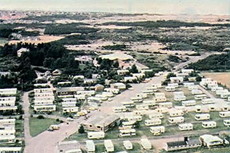 An old photo of the arial view of the original Findhorn trailer park.