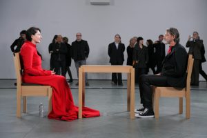 Marina Abramović, The Artist Is Present (2010), Museum of Modern Art, New York. Abramović's former partner Ulay joins her during her performance at her career retrospective.