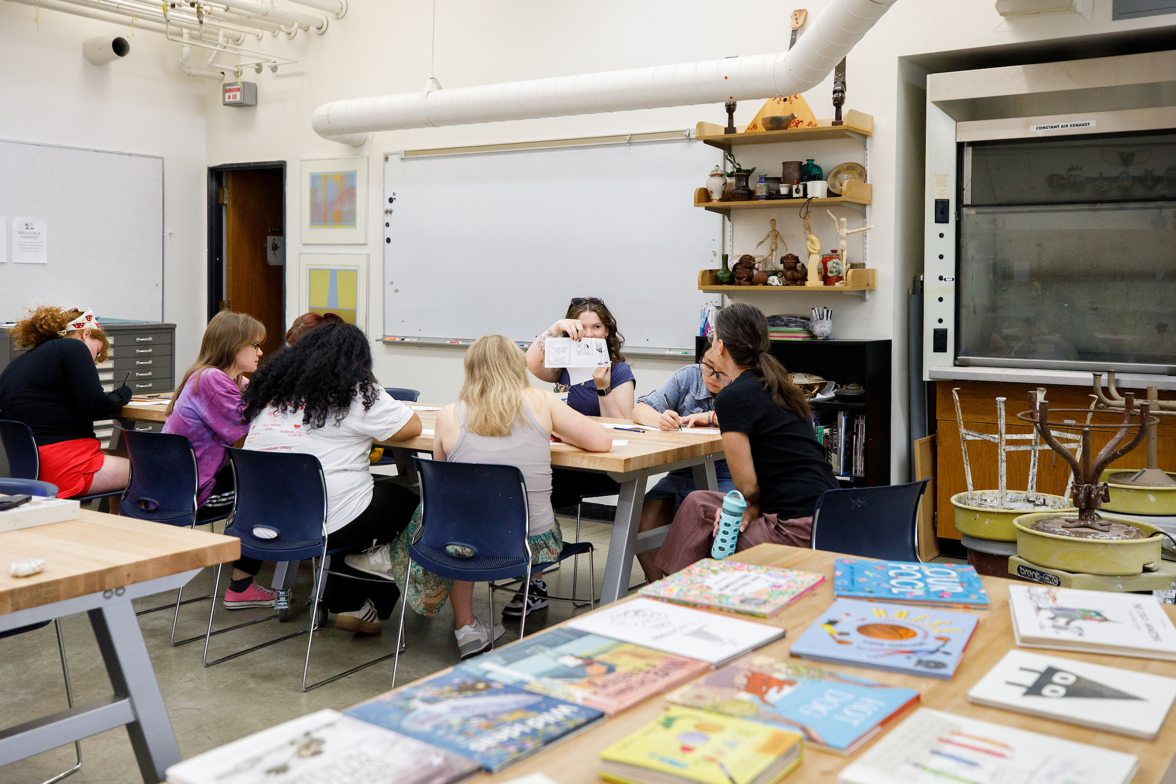 Students work on their project in the Art Education classroom of the Humanities Building at the University of Wisconsin–Madison.
