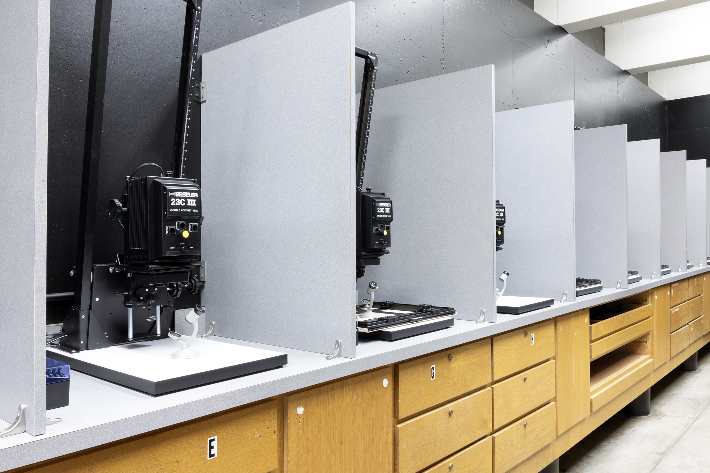 A row of multiple light enlargers available to the Darkroom Photography students to complete their work at the University of Wisconsin–Madison.