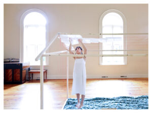 Blue Naga, an MFA candidate in UW-Madison’s Art Department, presents “Up to the Elephant, Down to the Dog,” a one-day performance and art installation at Gates of Heaven in Madison, Wis. Wednesday, Sept. 3, 2025. The work is an exploration of the intergenerational impact of displacement that resulted from the Vietnam War. The writings of UW-Madison anthropology professor Nam C. Kim, who emigrated to the United States from Saigon with his family as a boy, inspired the presentation, which included voice recordings and musical elements, centered around a theme of what constitutes ‘home.’ JOHN HART, STATE JOURNAL.